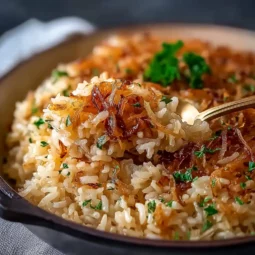 Served French onion rice on a plate