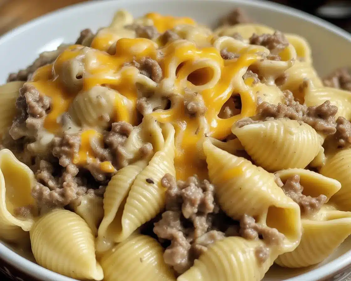 Crockpot Cheesy Ranch Beef Pasta Shells with ground beef, creamy cheese, and pasta.