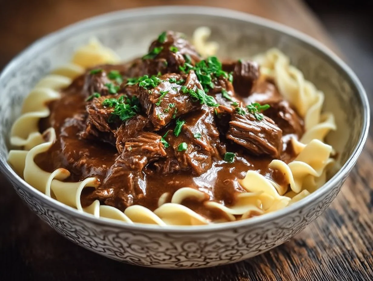 Delicious slow-cooked beef and noodles served in a bowl