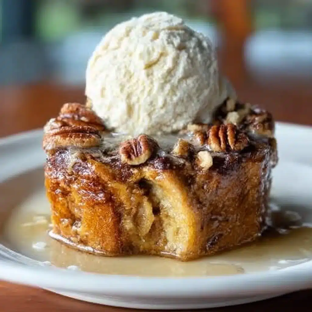 Indulgent pecan pie bread pudding served with a caramel drizzle.