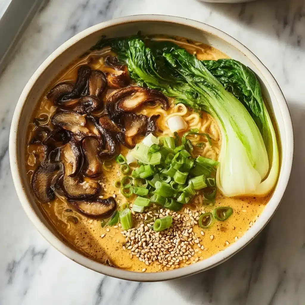 Bowl of Vegan Spicy Ramen topped with fresh vegetables and chili flakes