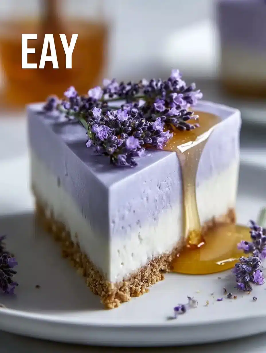 No Bake Honey Lavender Cheesecake topped with lavender flowers and honey drizzle