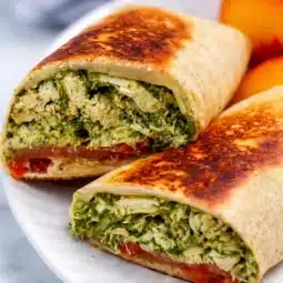 Healthy Chicken Pesto Protein Wrap with veggies and creamy pesto sauce