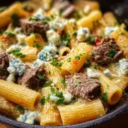 Baked Steak and Blue Cheese Rigatoni in a casserole dish