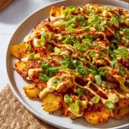 Crispy Gochujang Potato Salad with vibrant vegetables and spices